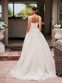 Moonlight Tango T929 voluminous net A-line gown with open back with lace straps and buttons along zipper with sweep train